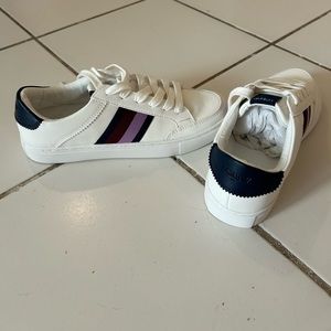 New. Never worn.J crew sneakers . White with stripes.Size 7.
